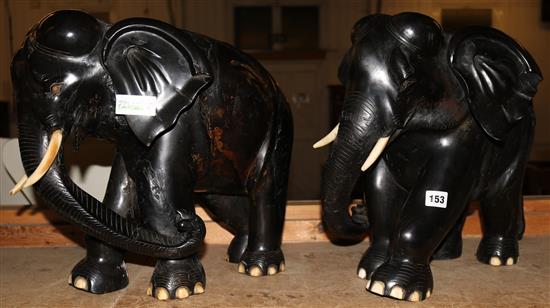 Pair large ebonised elephants